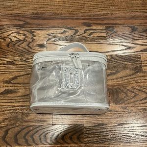 Brand new tags on makeup bag